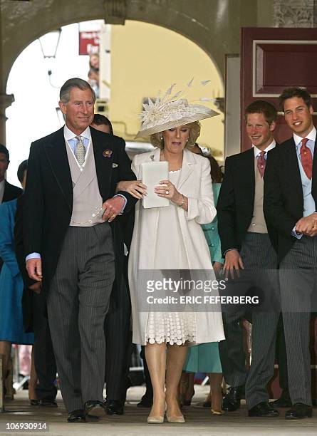 Prince Charles and his wife the Duchess of Cornwall, formerly Camilla Parker Bowles are followed by Princes Harry and William as they leave the...
