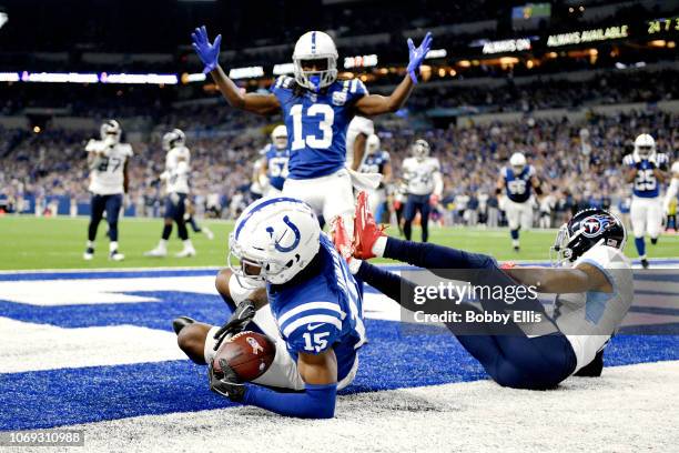 Wide receiver T.Y. Hilton of the Indianapolis Colts celebrates after wide receiver Dontrelle Inman scores a touchdown in the fourth quarter of the...