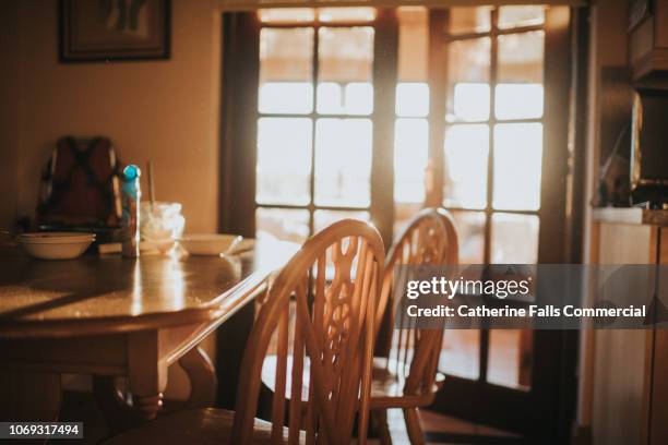 chairs in sun - kitchen fashion stock pictures, royalty-free photos & images