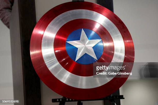 Replica of a shield used by the character Captain America in "The Avengers" movie franchise is on display at a celebration of life and legacy of...