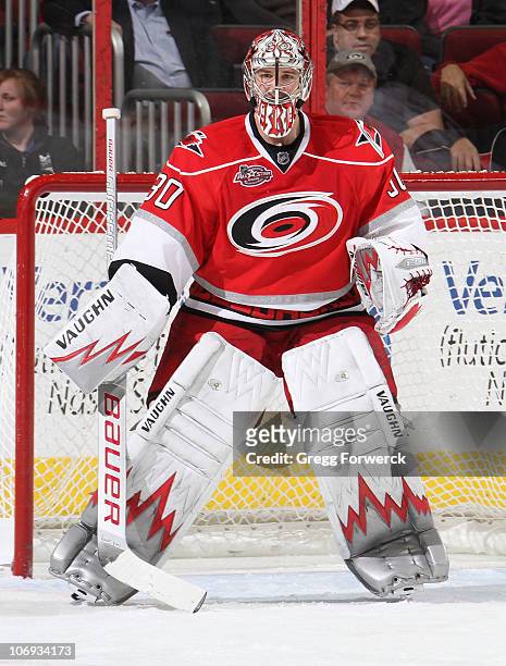 Cam Ward of the Carolina Hurricanes stands tall in the crease during a NHL game against the Edmonton Oilers on November 9, 2010 at RBC Center in...