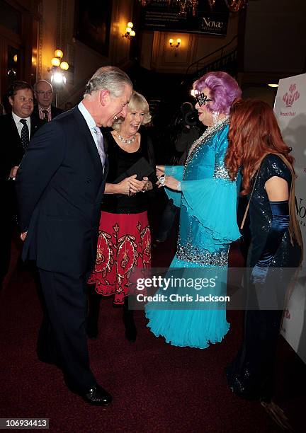 Prince Charles, Prince of Wales, Camilla, Duchess of Cornwall, Barry Humphries as Dame Edna Everage, and singer Paloma Faith arrive at The Prince's...