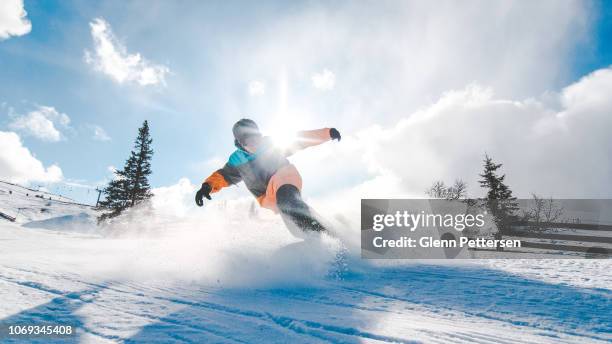 young adult snowboarding in trysil, norway. - ski resort stock pictures, royalty-free photos & images