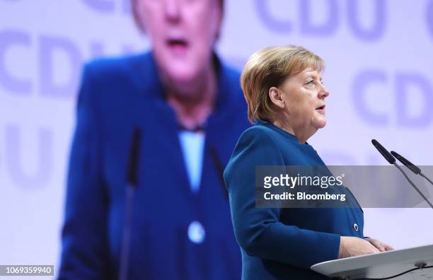 Angela Merkel, Germany's chancellor and Christian Democrat Union leader, delivers her speech at the CDU party conference in Hamburg, Germany, on...