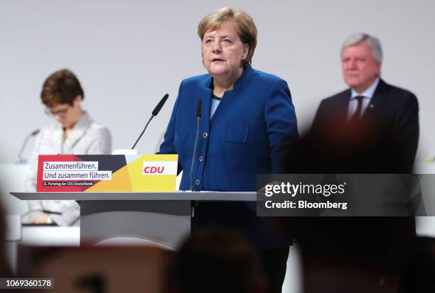 Angela Merkel, Germany's chancellor and Christian Democrat Union leader, delivers her speech at the CDU party conference in Hamburg, Germany, on...