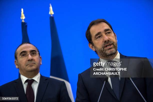French Interior Minister Christophe Castaner , flanked by French Junior Minister attached to the Interior Ministry Laurent Nunez speaks during a...