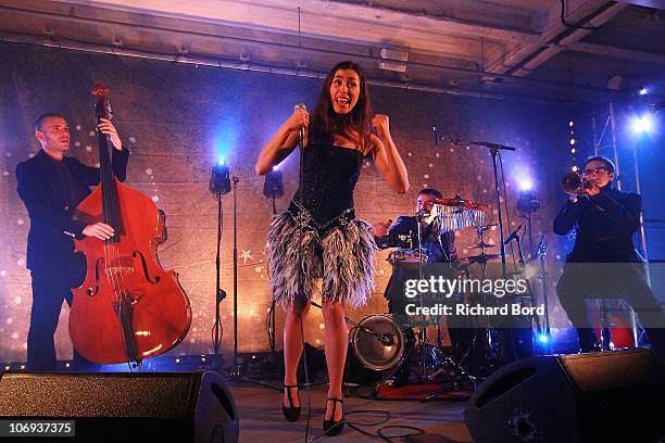 Olivia Ruiz performs live on the 'BHV Homme' stage after she launched the Christmas Illuminations at Bazar de l'Hotel de Ville on November 17, 2010...