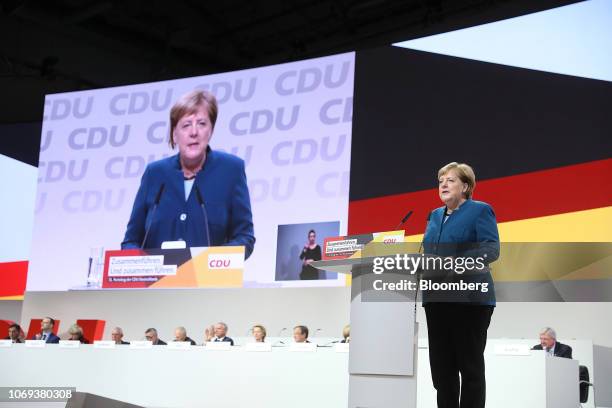 Angela Merkel, Germany's chancellor and Christian Democrat Union leader, delivers her speech at the CDU party conference in Hamburg, Germany, on...