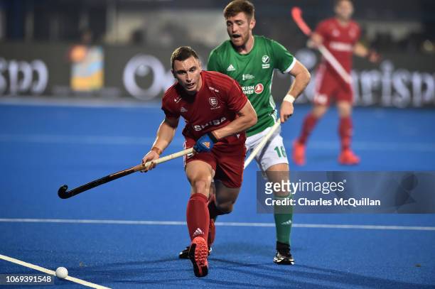 Harry Martin of England battles for possession with Shane O'Donoghue of Ireland during the FIH Men's Hockey World Cup Group B match between Ireland...