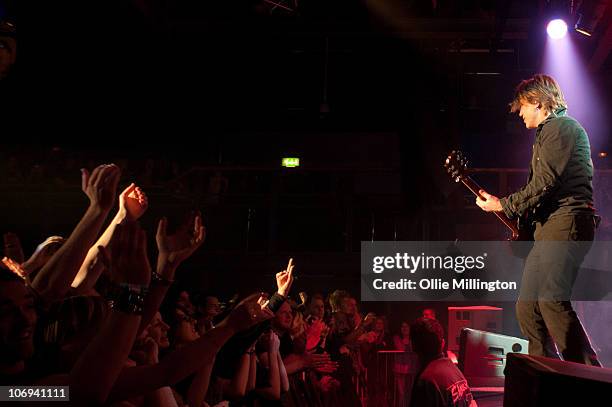 John Rzeznik of Goo Goo Dolls performs on the edge of the stage at O2 Academy on November 17, 2010 in Leicester, England.