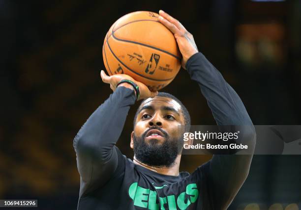 Boston Celtics' Kyrie Irving takes some free throw shots during pregame practice. The Boston Celtics host the New York Knicks in a regular season NBA...