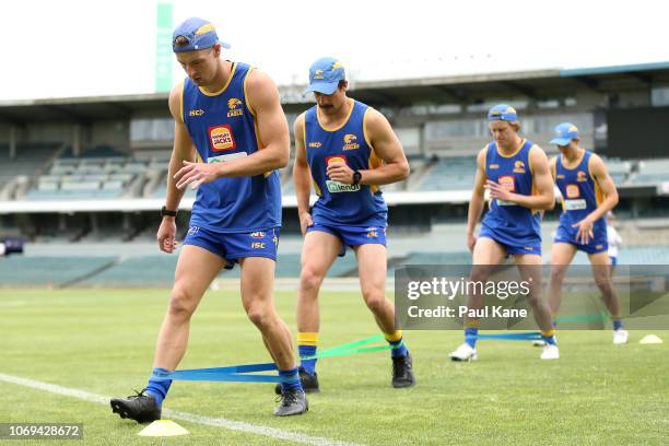 Kurt Mutimer works on a resistance training drill during a West Coast Eagles AFL training session at Subiaco Oval on November 19, 2018 in Perth,...