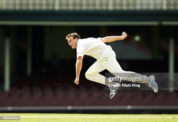 Doug Bollinger of the Blues bowls during day two of the Sheffield Shield match between the New South Wales Blues and the Tasmanian Tigers at the...