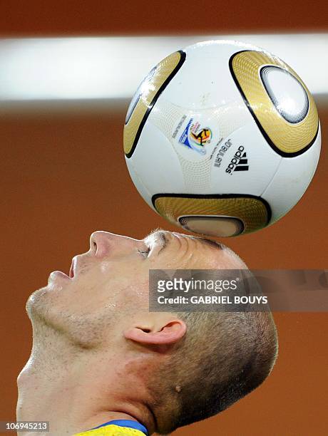 Netherlands' striker Arjen Robben controls the ball during an official training session at Soccer City stadium in Soweto, suburban Johannesburg, on...