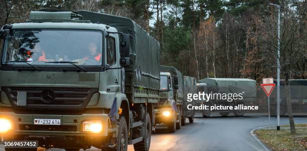 December 2018, Brandenburg, Beelitz: After the NATO exercise "Trident Juncture" in Norway, soldiers of the logistics battalion enter the...