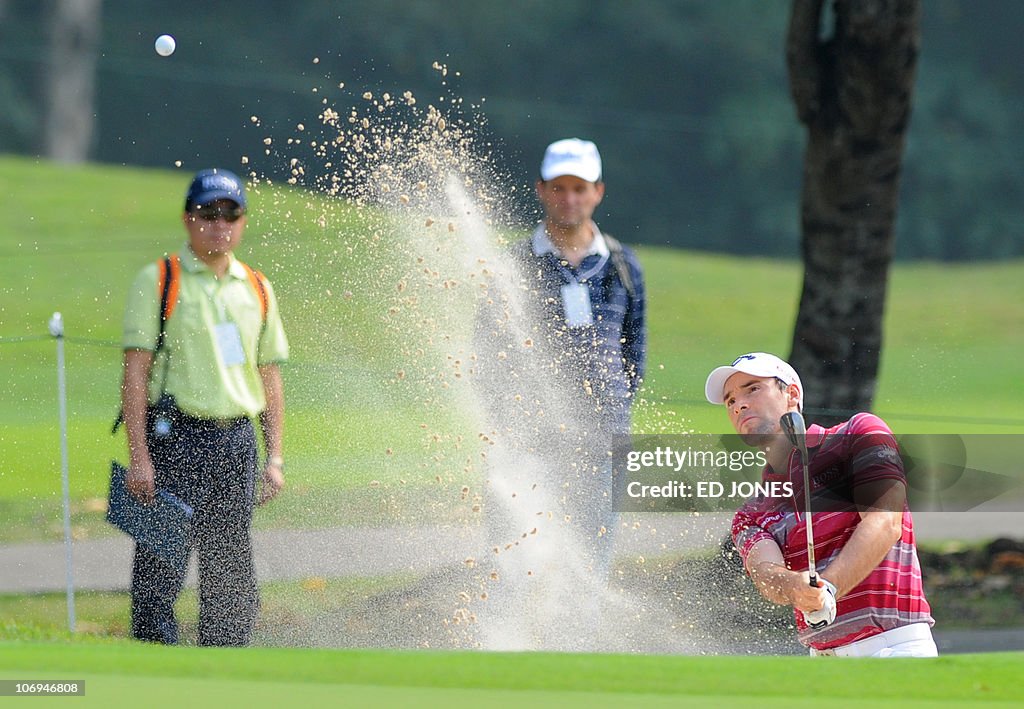 Oliver wilson of Britain hits a bunker s