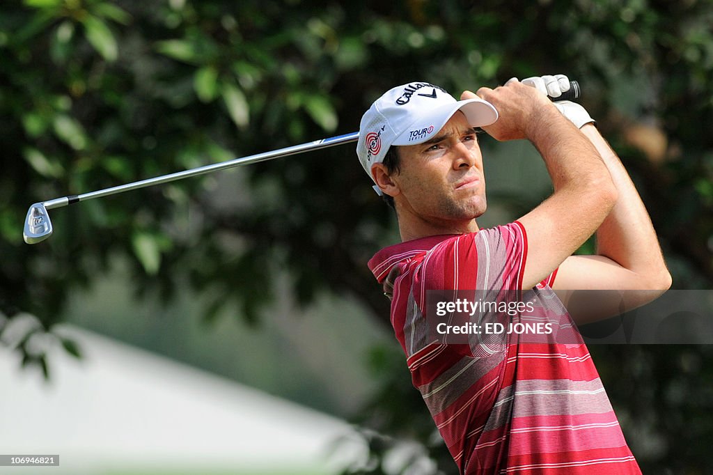 Oliver Wilson of Britain tees off as he