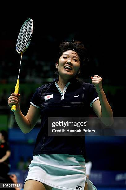 Eriko Hirose of Japan celebrates in the Women's Badminton Singles Quarterfinal Match against Mew Choo Wong of Malaysia during day six of the 16th...