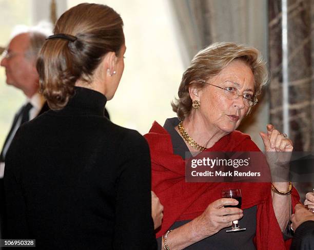 Princess Claire of Belgium and Queen Paola of Belgium attend a reception after a conference about " Vulnerable children on the run" at The Royal...