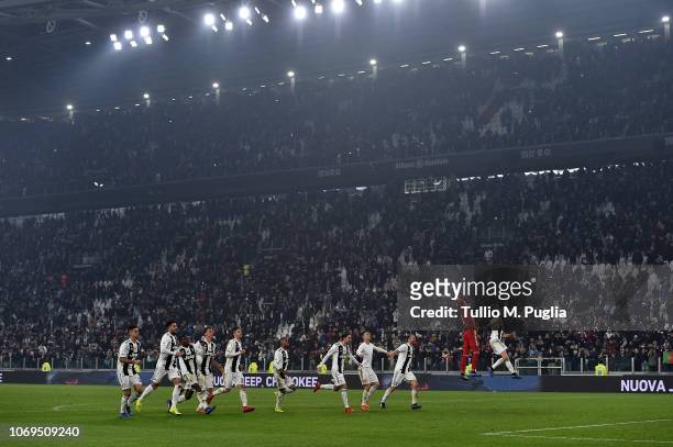 Players of Juventus celebrate after winning the Serie A match between Juventus and FC Internazionale at Allianz Stadium on December 7, 2018 in Turin,...