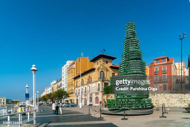 monument made with cider bottles in gijon, spain - gijon stock pictures, royalty-free photos & images