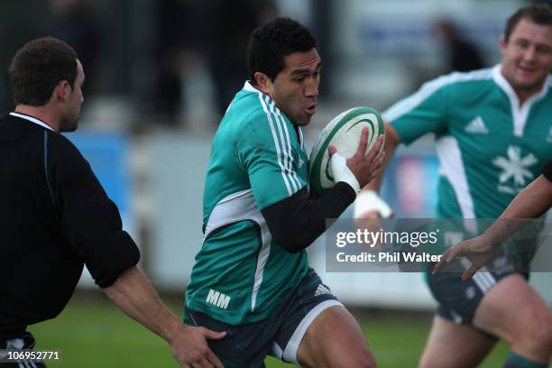 Mils Muliaina of the All Blacks runs the ball during a New Zealand All Black training session at the Ashbourne Rugby Club on November 18, 2010 in...