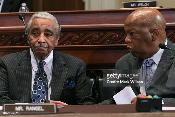 Rep. Charlie Rangel sits with U.S. Rep. John Lewis during a House Committee on Standards of Official Conduct hearing November 18, 2010 in Washington,...