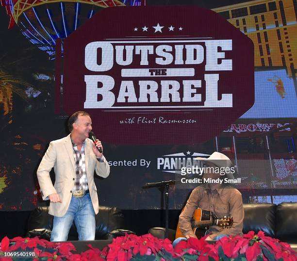 Flint Rasmussen and Ned LeDoux speak onstage during the "Outside the Barrel" with Flint Rasmussen show during the National Finals Rodeo's Cowboy...