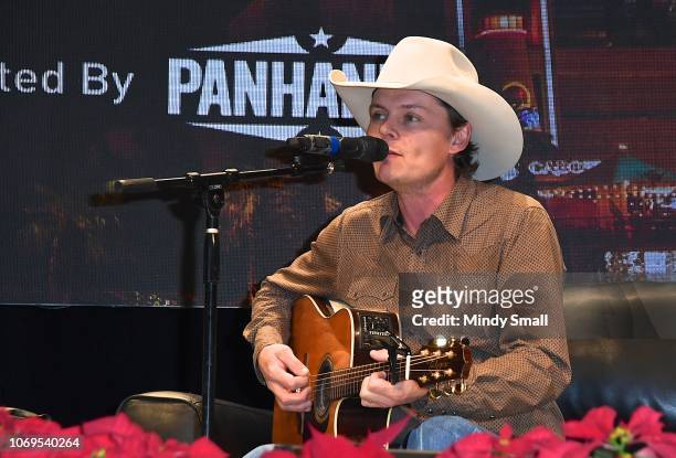 Ned LeDoux performs onstage during the "Outside the Barrel" with Flint Rasmussen show during the National Finals Rodeo's Cowboy Christmas at the Las...