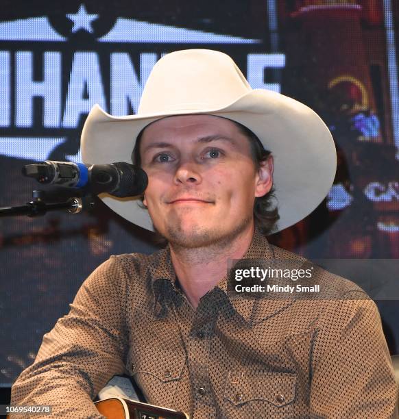 Ned LeDoux performs onstage during the "Outside the Barrel" with Flint Rasmussen show during the National Finals Rodeo's Cowboy Christmas at the Las...