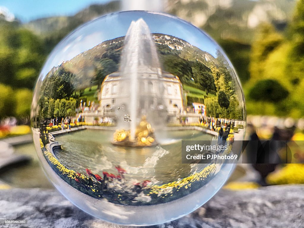 The fountain of Linderhof Castle through a lensball