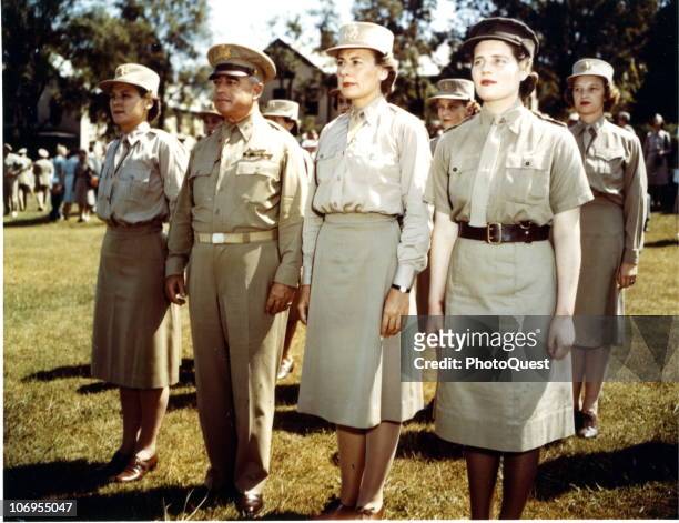 Portrait of Mary Churchill of the Women�s Royal Voluntary Service as she pose with, among others, Colonel H.B. Brown and Major Florence Newsome , the...