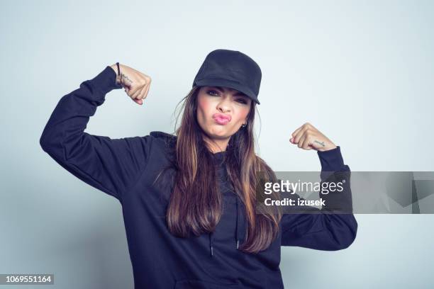 strong rebel young woman - rapper stock pictures, royalty-free photos & images