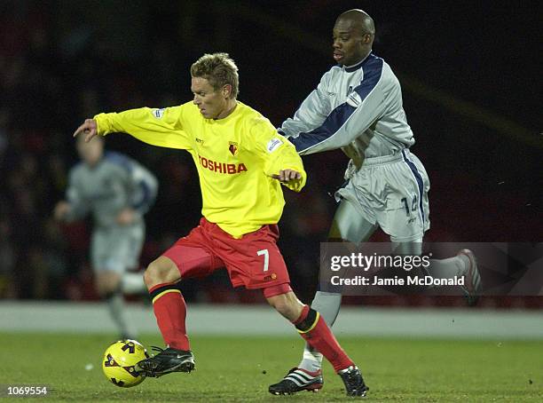 Allan Nielsen of Watford holds off George Ndah of Wolves during the Nationwide Division One game between Watford and Wolverhampton Wanderers at the...