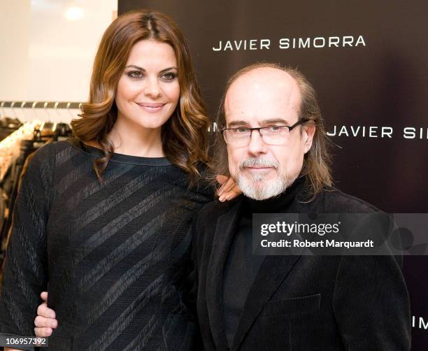 Fashion designer Javier Simorra and Maria Jose Suarez attend the 'Javier Simorra' store opening at the Pedrables Center on November 18, 2010 in...