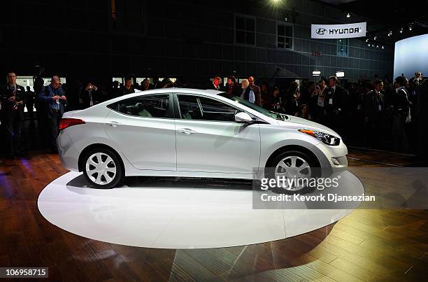 The new Hyundai Elantra is revealed at the two-day media preview event for the 2010 Los Angeles Auto Show on November 18, 2010 in Los Angeles,...