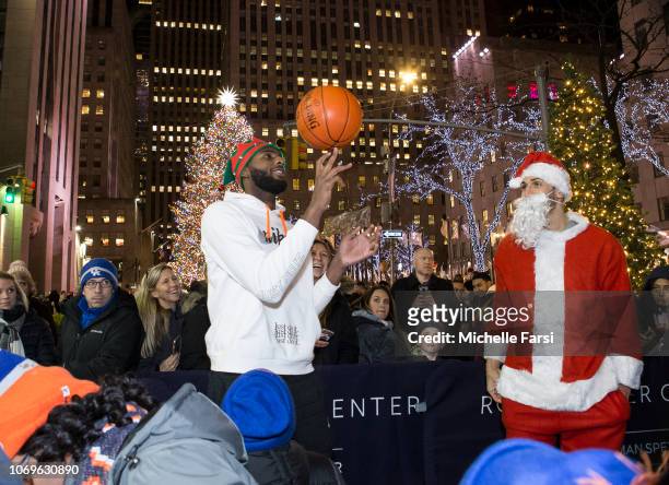 Enes Kanter, Kevin Knox and Mitchell Robinson of the New York Knicks with tv personality Jill Martin, surprise children from the Garden of Dreams...