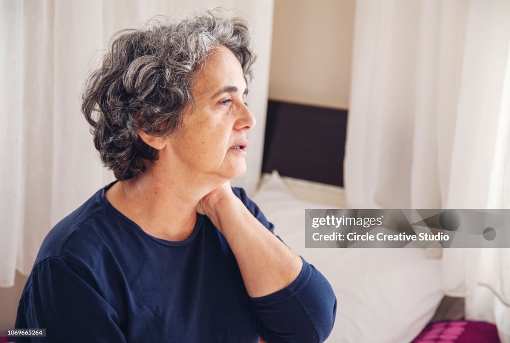 Senior Woman having pain and sickness