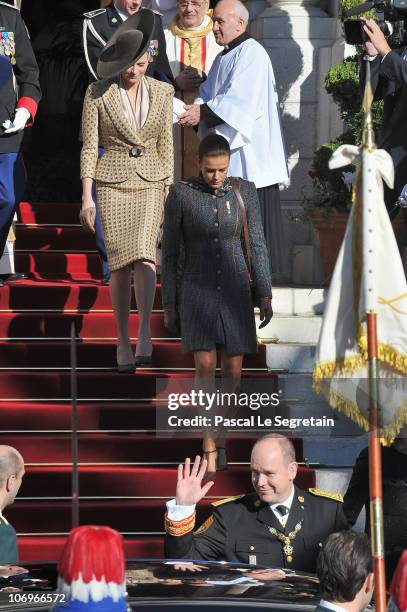 Prince Albert II of Monaco , Charlene Wittstock and princess Stephanie of Monaco leave the Cathedral after they attended the annual traditional...