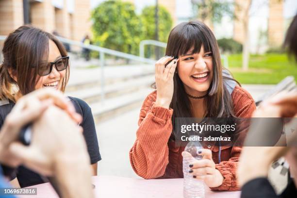 group of diverse college students around the table - round table discussion stock pictures, royalty-free photos & images