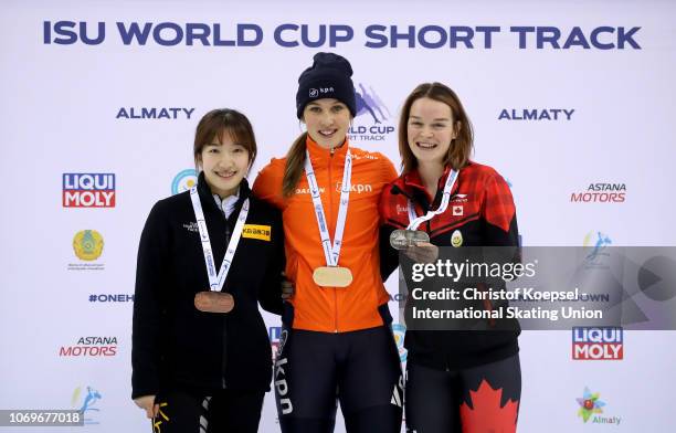 Ah Rum Noh of South Korea poses during the medal ceremony after winning the 3rd place , Suzanne Schulting of Netherlands poses during the medal...