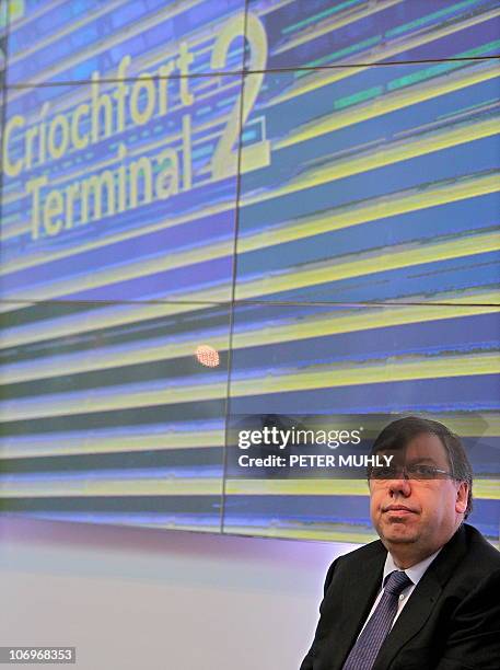 Irish Prime Minister Brian Cowen listens to speeches during the opening of Dublin airport's new Terminal 2 in Ireland, on November 19, 2010....