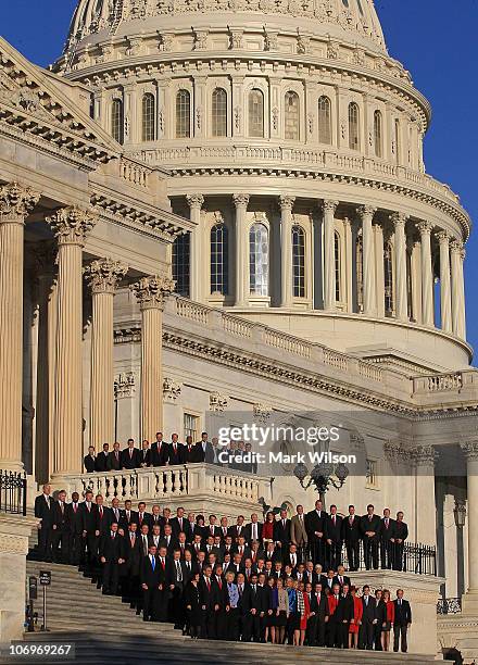 Newly elected freshman members of the upcoming 112th Congress pose for a class photo on the steps of the U.S. Capitol on November 19, 2010 in...