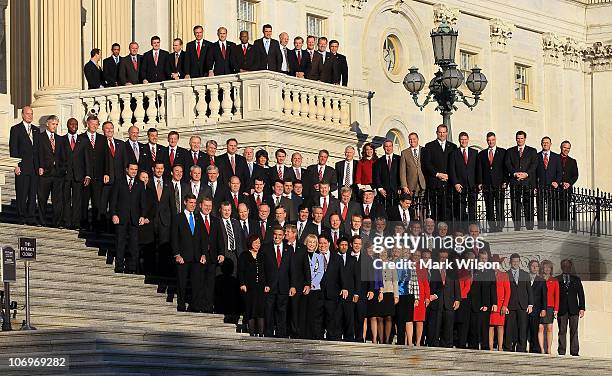 Newly elected freshman members of the upcoming 112th Congress pose for a class photo on the steps of the U.S. Capitol on November 19, 2010 in...