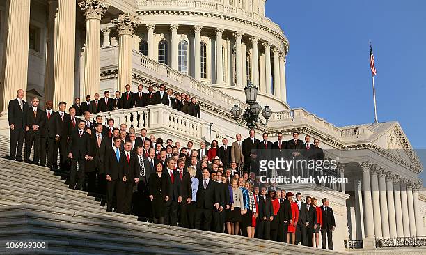 Newly elected freshman members of the upcoming 112th Congress pose for a class photo on the steps of the U.S. Capitol on November 19, 2010 in...
