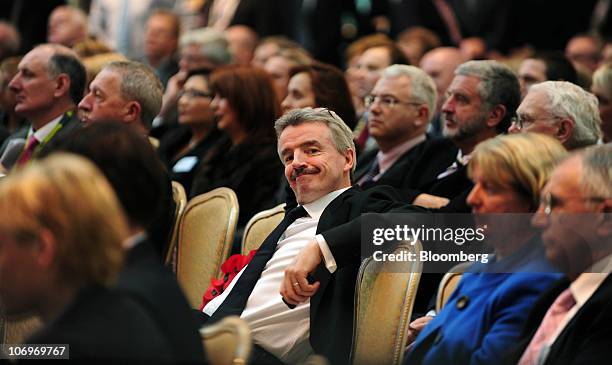 Michael O'Leary, chief executive officer of Ryanair Holdings Plc, center, sits during a news conference at Dublin airport's Terminal 2, in Dublin,...