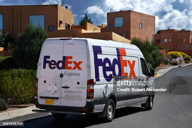 Federal Express, or FedEx van delivers packages in Santa Fe, New Mexico.
