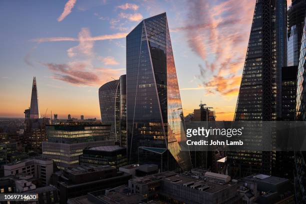city of london financial district at sunset - london skyline stock pictures, royalty-free photos & images