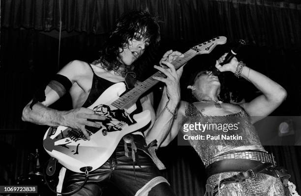 Guitarist Warren DeMartini, left, and Stephen Pearcy of the band RATT perform on stage at the Embassy Ballroom in Chicago, Illinois, July 11, 1984.