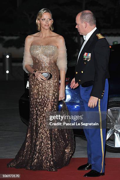 Prince Albert II of Monaco and Charlene Wittstock arrive to attend the Monaco National day Gala concert at Grimaldi forum on November 19, 2010 in...